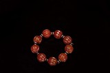 AN AMBER MELON SHAPED BRACELET