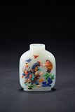 A WHITE JADE EMBELLISHED SNUFF BOTTLE
