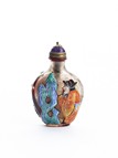 A GLASS PAINTED OVERLAY SNUFF BOTTLE