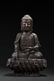 A LARGE BRONZE FIGURE OF SHAKYAMUNI