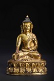 A GILT-BRONZE FIGURE OF SHAKYAMUNI