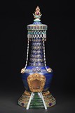 A GILT-BRONZE LAPIS LAZULI AND GEMS-INLAID STUPA MODEL
