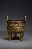 A GILT-BRONZE 'TAOTIE' TRIPOD CENSER