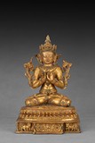 A GILT-BRONZE FIGURE OF MANJUSRI