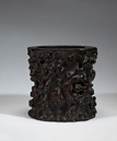 A NATURALISTIC ZITAN CARVED BRUSHPOT