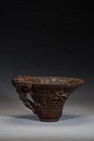 AN ALOESWOOD CARVED 'DRAGON' LIBATION CUP