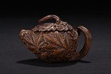 A BAMBOO ROOT CARVED TEAPOT
