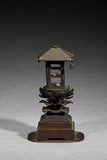 A BRONZE PAGODA MODEL CONTAINING TWO SARIRA BEADS