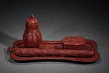 A SET OF FOUR CINNABAR LACQUER SCHOLAR'S OBJECTS