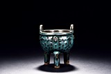 A FLAMBE GLAZED TRIPOD CENSER