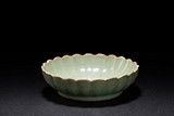 A CELADON GLAZED CHRYSANTHEMUM DISH