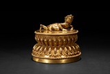 A GILT-BRONZE DOUBLE LOTUS STAND WITH FIGURE 