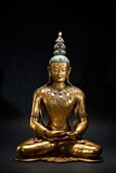 AN IMPRESSIVE GILT-BRONZE FIGURE OF AMITAYUS