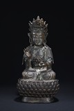 A BRONZE FIGURE OF GUANYIN