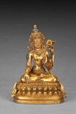 A GILT-BRONZE FIGURE OF WHITE TARA