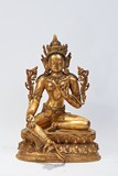 A GILT-BRONZE FIGURE OF TARA