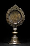 A TIBETAN BRONZE ALTAR MIRROR STAND