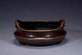 A BRONZE XUANDE TRIPOD CENSER