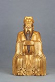 A GILT-BRONZE FIGURE OF GUANDI