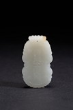 A WHITE JADE 'RIVERSIDE' PENDANT