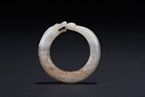 A WHITE JADE DRAGON BANGLE