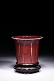 A RED GLAZED JARDINIERE