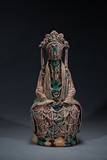 A PORCELAIN FIGURE OF SEATED GUANYIN