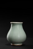 A CELADON GLAZED VASE