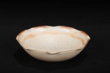 A DING-TYPE WHITE GLAZED 'FLOWER' BOWL