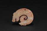 A CARVED ‘GU' MOTIF DRAGON JADE PENDANT