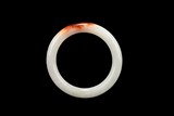 A CARNELIAN JADE BANGLE