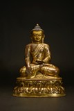 A GILT-BRONZE FIGURE OF SHAKYAMUNI