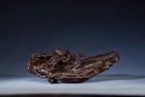 AN AGARWOOD CARVED 'BAT' WASHER