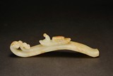 A WHITE RUSSET JADE 'DRAGON' BELT HOOK