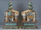 A PAIR OF CLOISONNE ENAMEL ELEPHANTS WITH STANDS