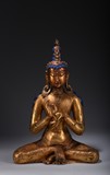 A GILT-BRONZE FIGURE OF MAITREYA