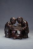 AN AGARWOOD 'TWO CHILDREN' CARVING