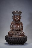A CARVED AGARWOOD FIGURE OF AMITABHA