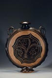 A BLACK GLAZED 'FLOWER' MOONFLASK