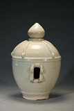 A BLUISH WHITE OVOID JAR