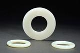 A SET OF THREE WHITE JADE ORNAMENTS