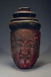 A WOOD PAINTED MASK