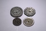 A SET OF FOUR BRONZE MIRRORS