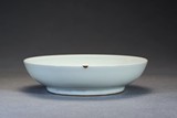 A TIANBAI WHITE GLAZED 'DRAGON' DISH