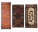 A GROUP OF THREE CHINESE RUGS