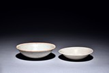 A GROUP OF TWO WHITE GLAZED BOWLS