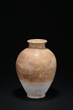 A WHITE-GLAZED TANG DYNASTY STONEWARE VASE