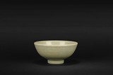 A MOULDED LONGQUAN CELADON BOWL