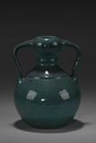 A ROBIN'S-EGG GLAZED TWO-HANDLED GARLIC-SHAPED VASE