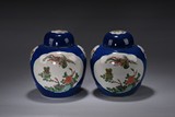 A PAIR OF BLUE-GLAZED JARS WITH COVERS